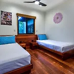 Indulge In The Lap Of Luxury, Iluka Is Your Private Ocean-View Haven On Half An Acre With Infinity Pool And Two Golf Buggies