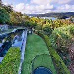 Indulge In The Lap Of Luxury, Iluka Is Your Private Ocean-View Haven On Half An Acre With Infinity Pool And Two Golf Buggies